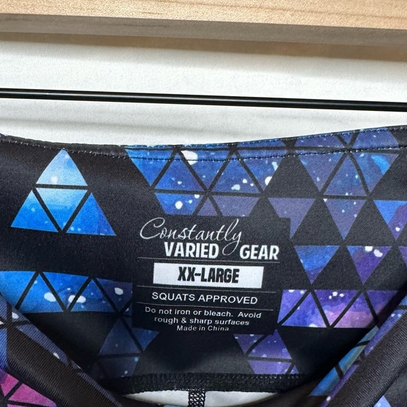 Constantly Varied Gear Geometric Blue and Black Leggings. Too long for me. - Picture 4 of 4